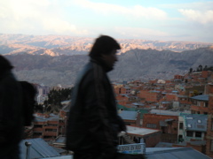 Amazing artsy photo of dude with La Paz and mountains in background