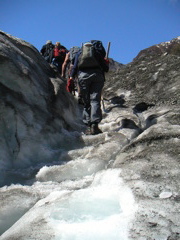 We put on crampons so as not to slip, but just to be safe our glacier guide chopped little steps in the ice for us with her pickaxe.  These steps have to be re-built every day as the glacier shifts overnight.