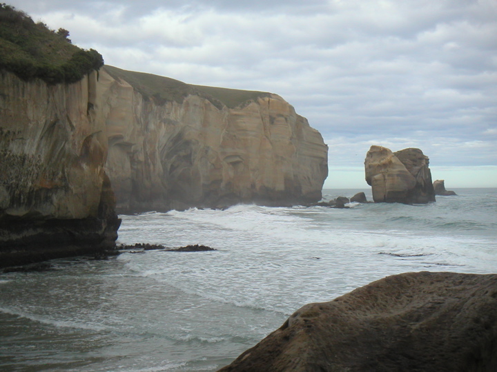 It's called Tunnel Beach because there is a man-made tunnel you walk through to get to the beach.  The tunnel was not very photogenic, but here is the view from the beach.  Click the picture for a movie version!