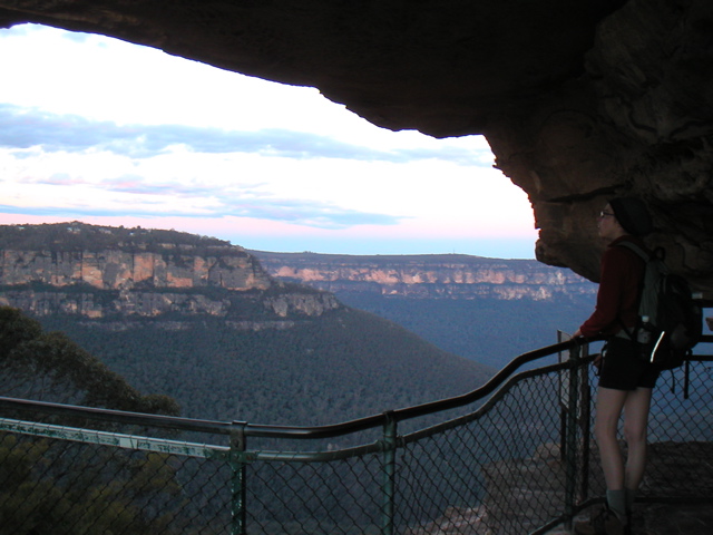 Hilary looks out over the setting sun from a perch high in the three sisters.  If you remember the previous picture, we are standing in the leftmost "sister".