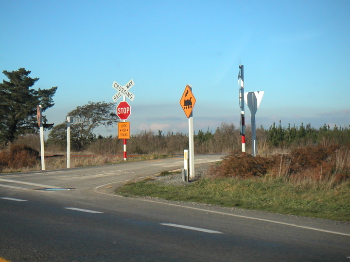 The highway paralleled the train tracks for much of the trip, so there were lots of these fun railway crossings... I especially like the little picture of a steam engine.