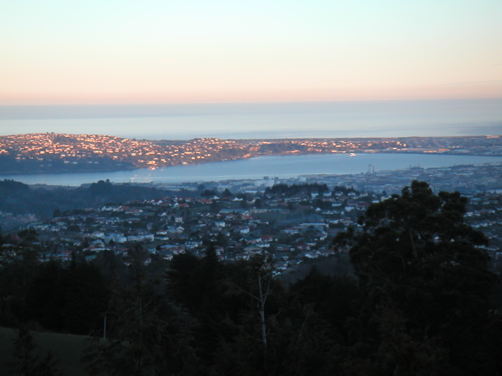 Turns out, there's also a road that goes up this mountain.  We bumped into a friend of Selina's there, who kindly drove us back to town!  Here is Dunedin at sunset.