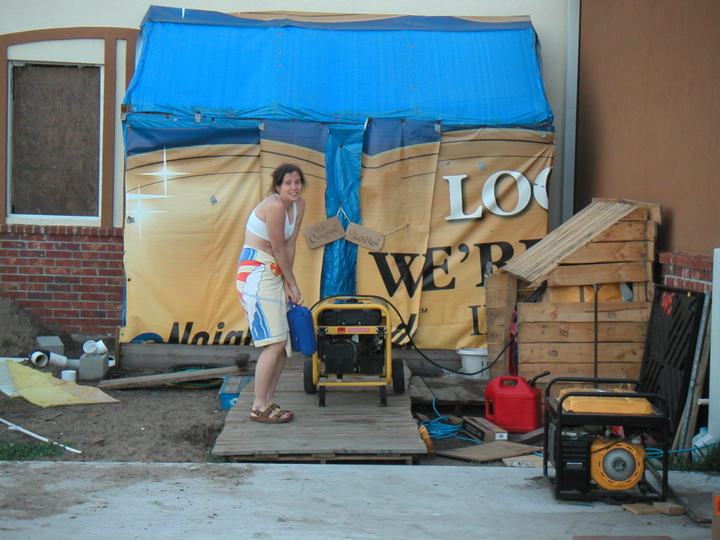 The generator was *supposed* to power the water heater, but it usually didn't work, thus taking showers was a particularly COLD experience, as Katie demonstrates