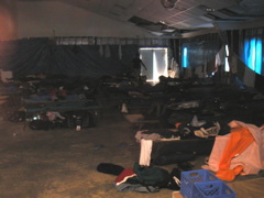 This is only about a third of the huge sleeping area.  It was in the main section of a huge gutted-out church building.  The cots were actually quite comfy.  There were about 75 people staying here.